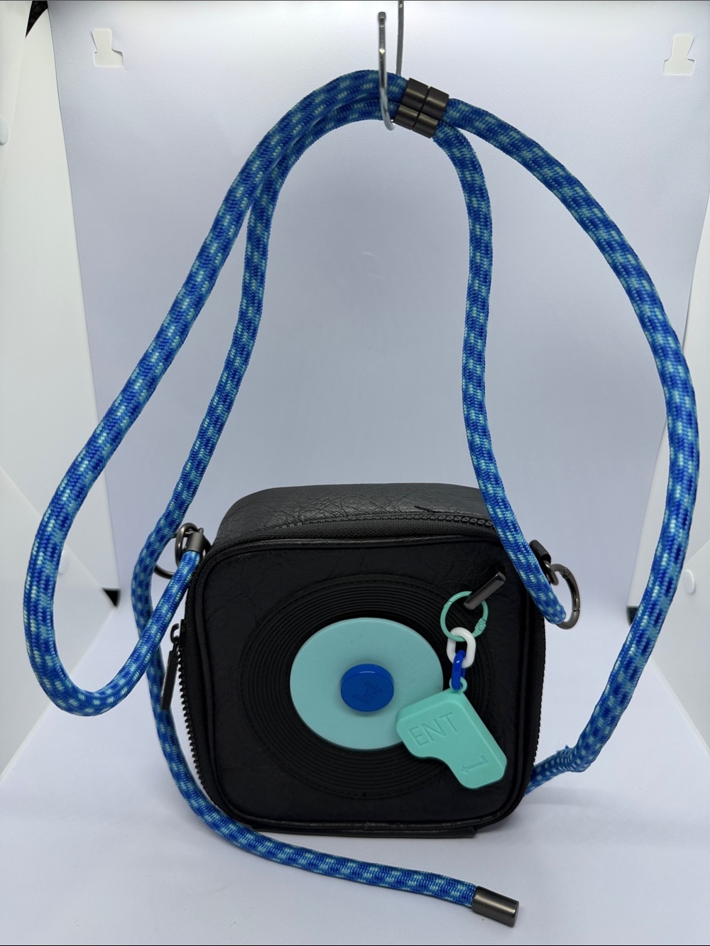 Black Camera Bag with Blue Woven Strap and Aqua Accent